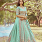 Gold Crushed Tissue Lehenga Choli with Moti and Zari Work