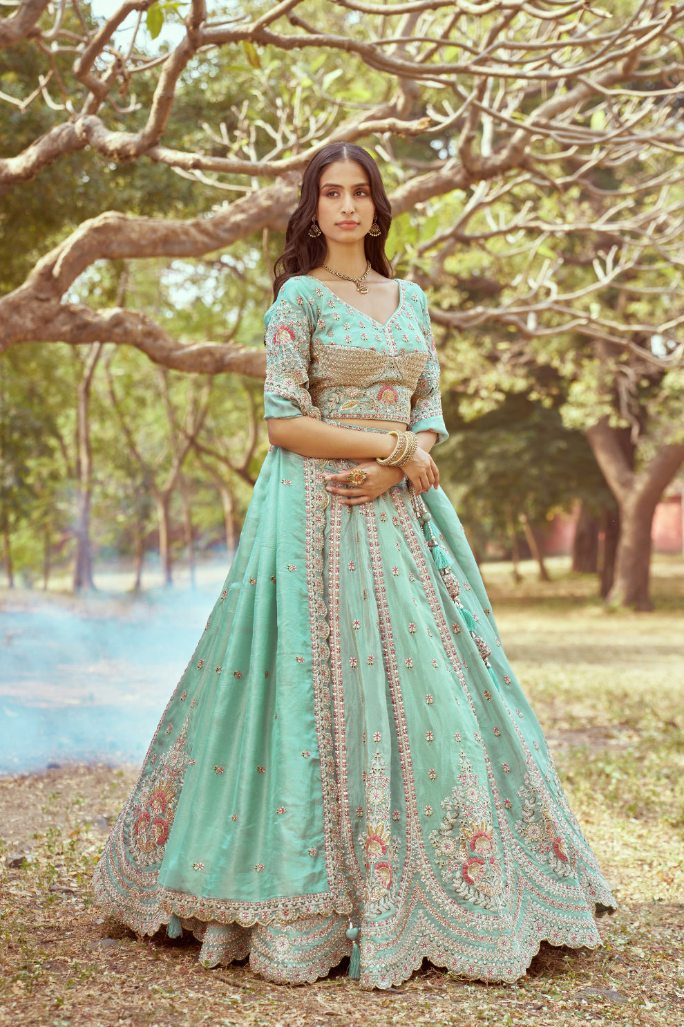 Gold Crushed Tissue Lehenga Choli with Moti and Zari Work