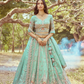 Gold Crushed Tissue Lehenga Choli with Moti and Zari Work