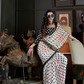 Patola Printed Satin Crepe Saree with Rich Ethnic Detailing