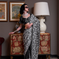 Patola Printed Satin Crepe Saree with Rich Ethnic Detailing