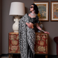 Patola Printed Satin Crepe Saree with Rich Ethnic Detailing