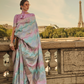 Banarasi Woven Satin Silk Blend Saree with Tassel Accents