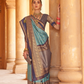 Kanjivaram Style Silk Saree with Designer Brooch and Clutch