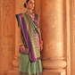 Kanjivaram Style Silk Saree with Designer Brooch and Clutch