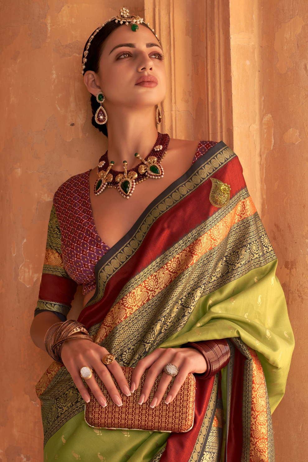 Kanjivaram Style Silk Saree with Designer Brooch and Clutch