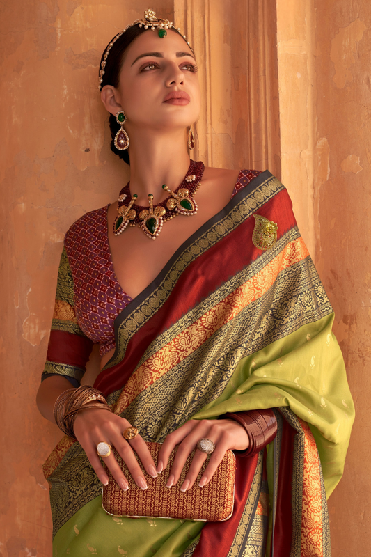 Kanjivaram Style Silk Saree with Designer Brooch and Clutch
