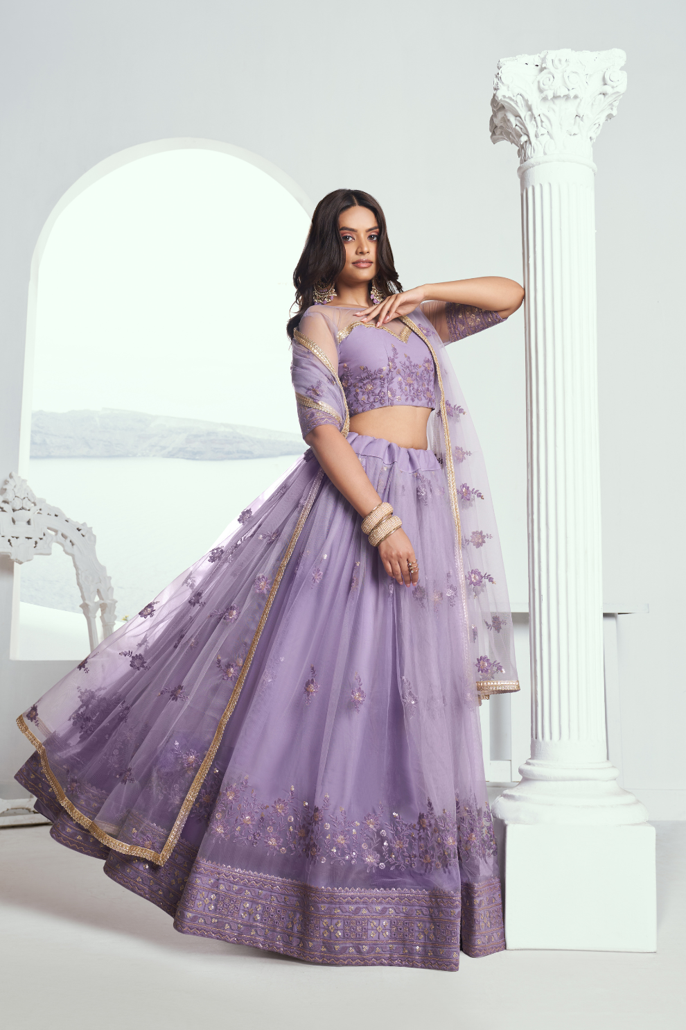 Graceful Net Lehenga Choli with Intricate Embroidery for Engagement Wear