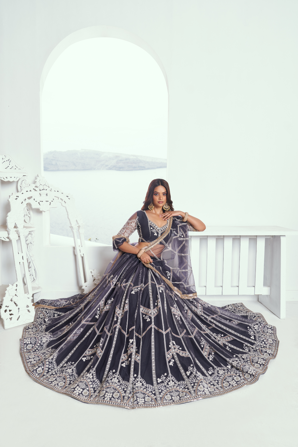 Graceful Net Lehenga Choli with Intricate Embroidery for Engagement Wear