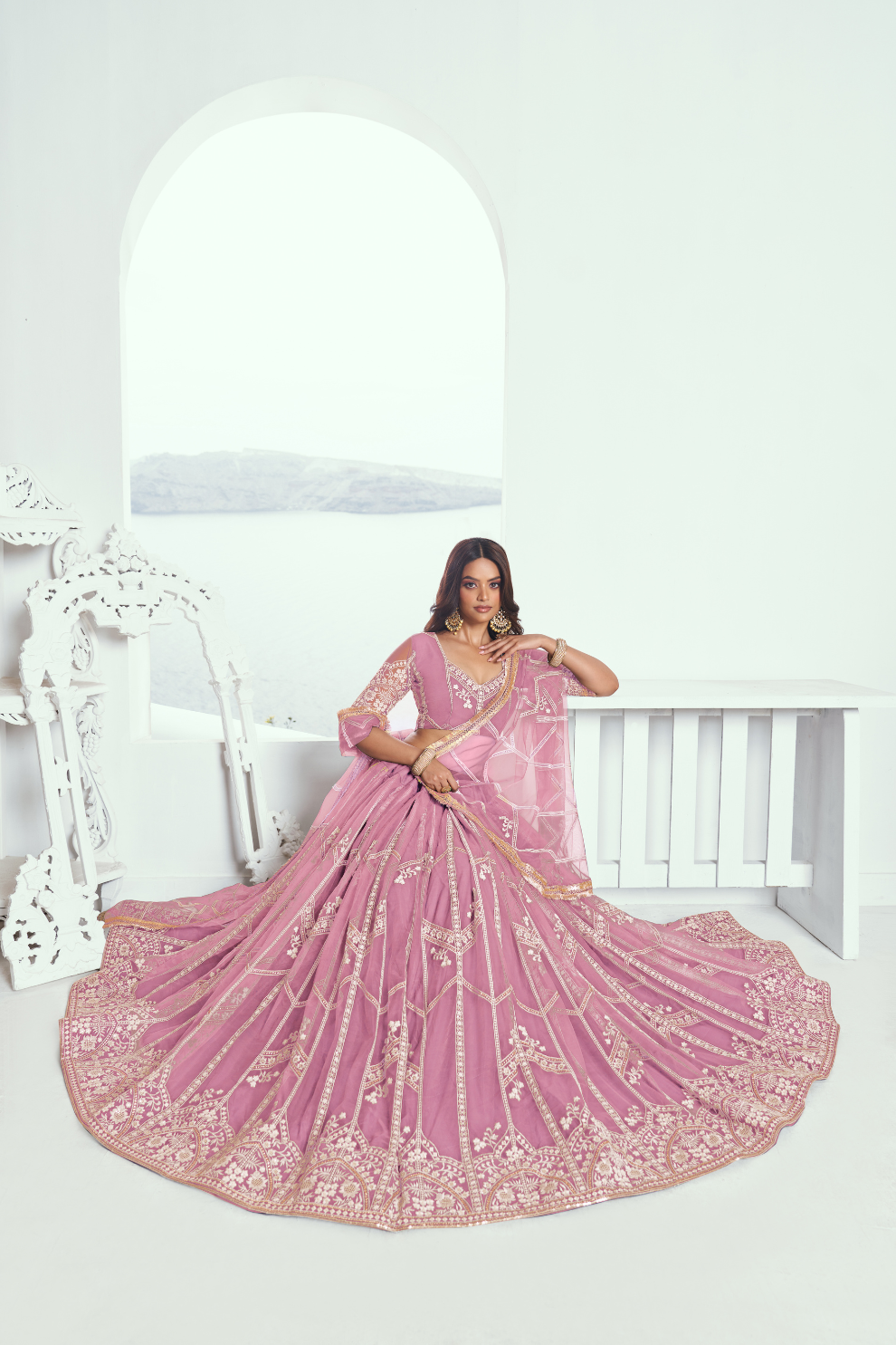 Graceful Net Lehenga Choli with Intricate Embroidery for Engagement Wear