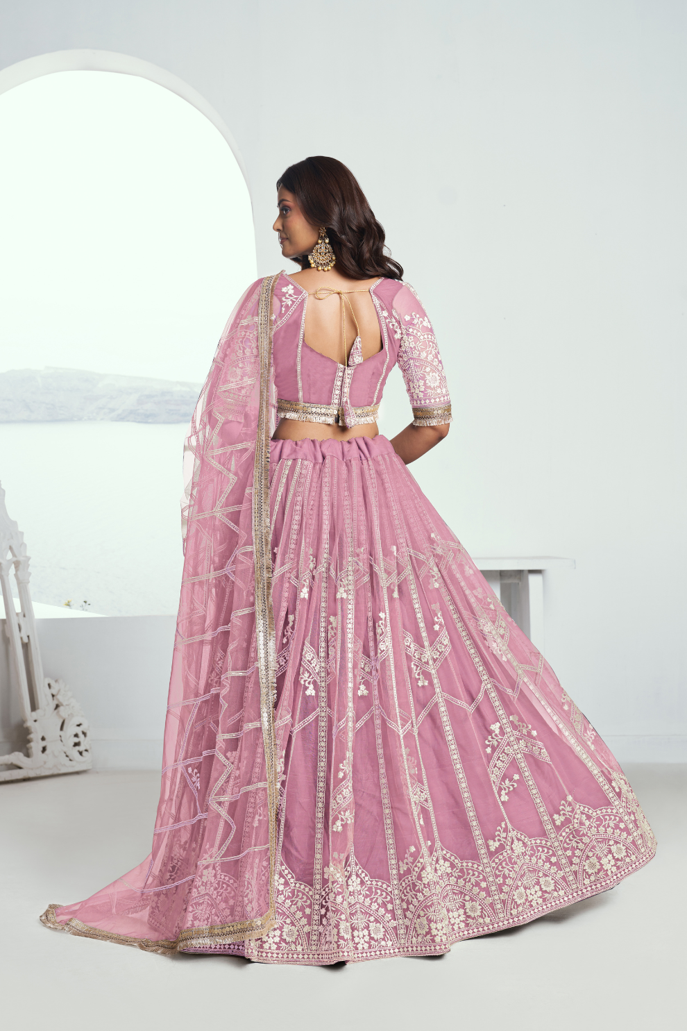 Graceful Net Lehenga Choli with Intricate Embroidery for Engagement Wear