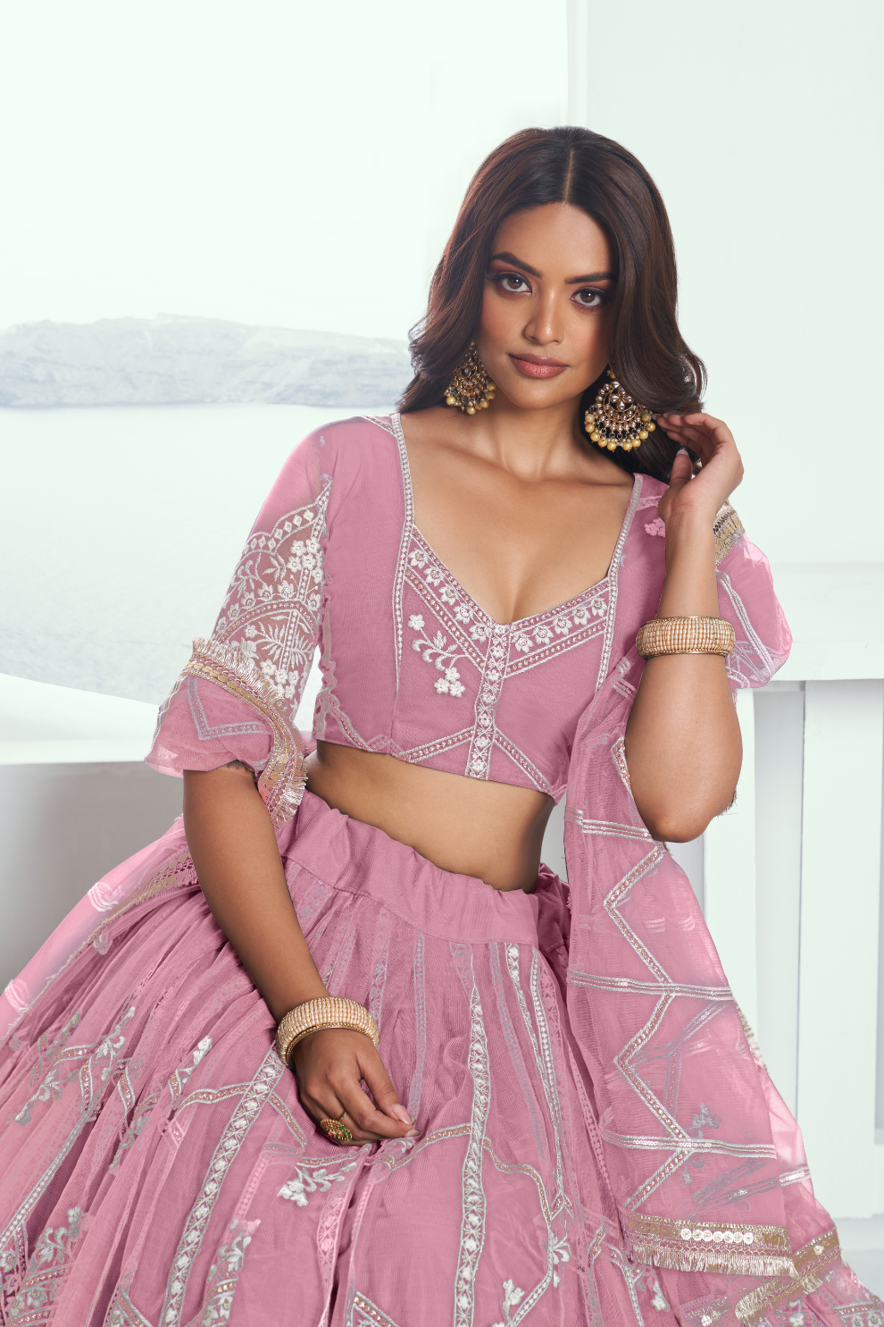 Graceful Net Lehenga Choli with Intricate Embroidery for Engagement Wear