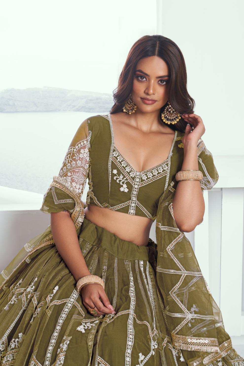 Graceful Net Lehenga Choli with Intricate Embroidery for Engagement Wear