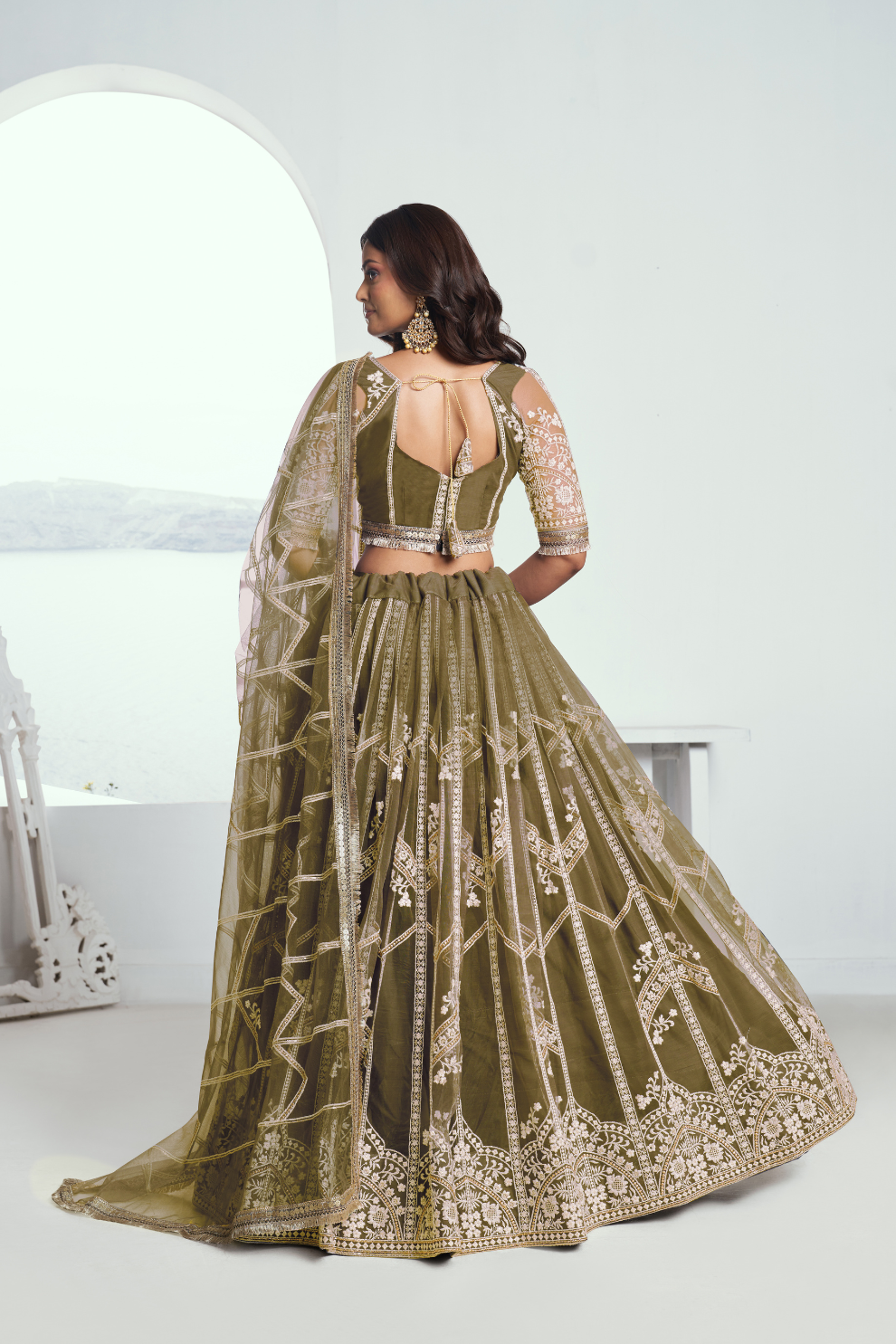 Graceful Net Lehenga Choli with Intricate Embroidery for Engagement Wear