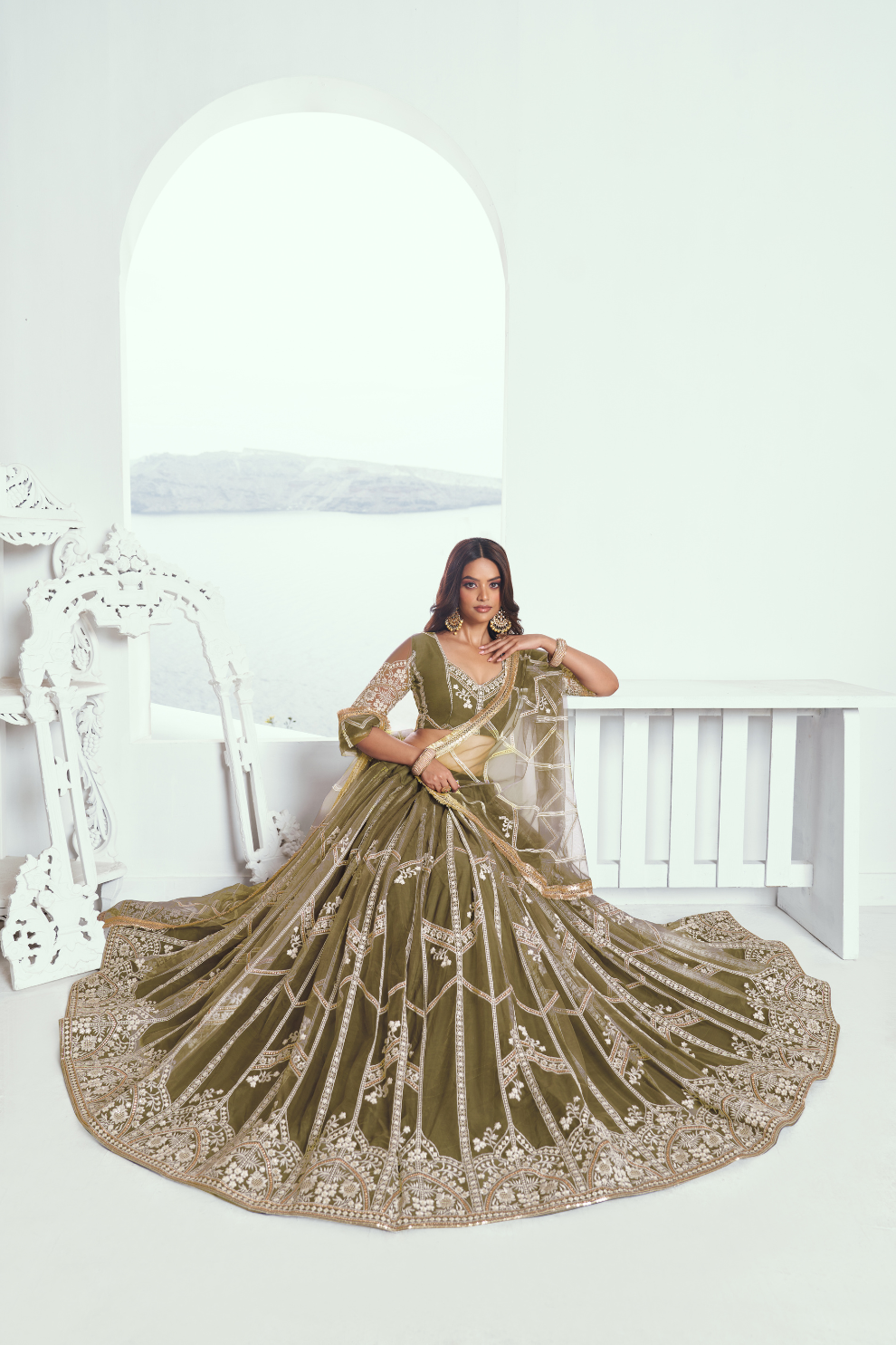 Graceful Net Lehenga Choli with Intricate Embroidery for Engagement Wear