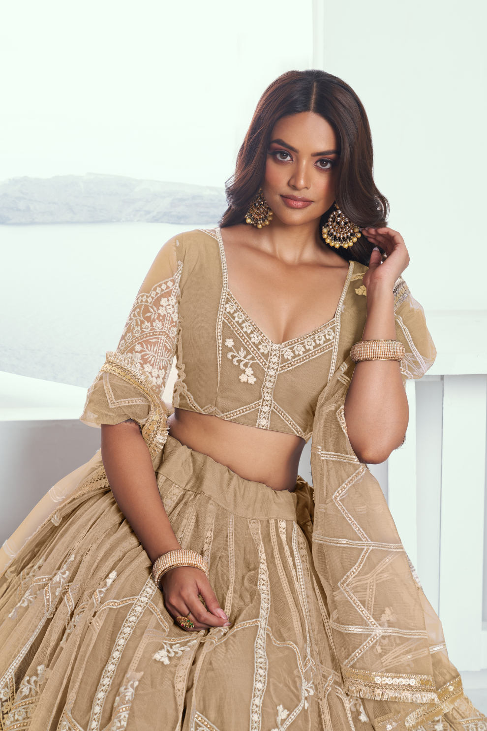 Graceful Net Lehenga Choli with Intricate Embroidery for Engagement Wear