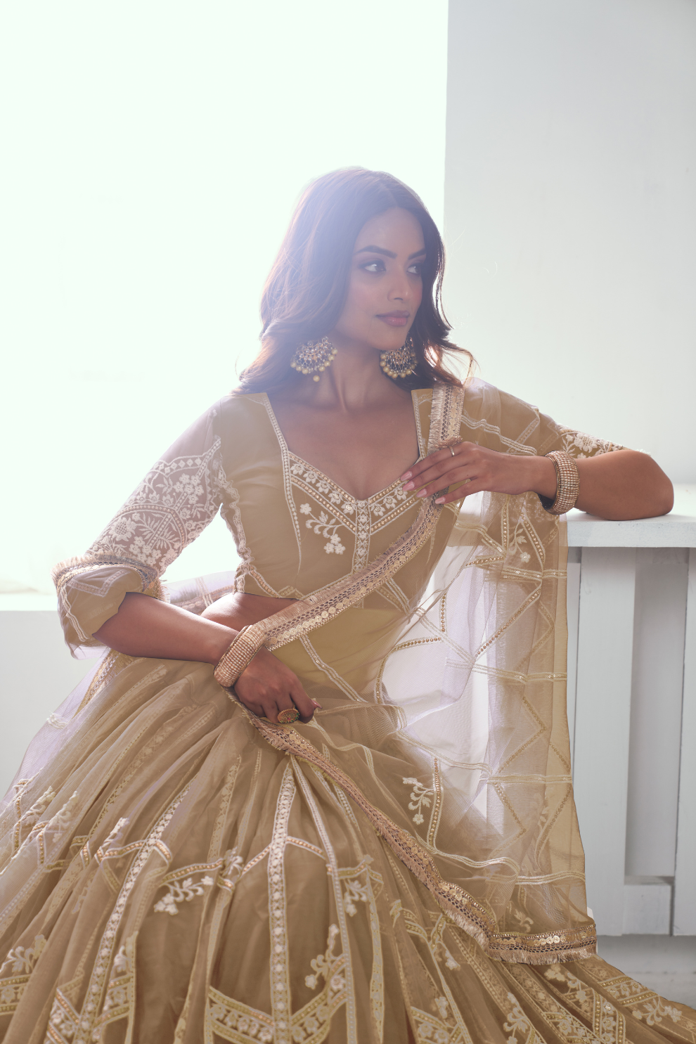 Graceful Net Lehenga Choli with Intricate Embroidery for Engagement Wear