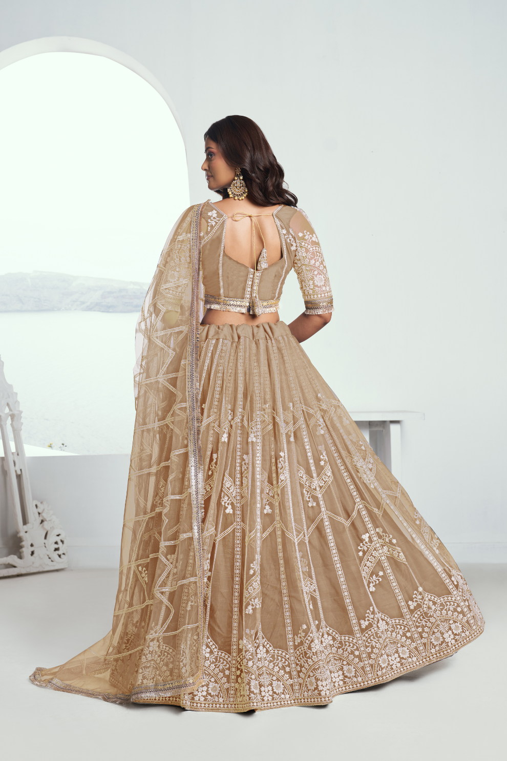 Graceful Net Lehenga Choli with Intricate Embroidery for Engagement Wear