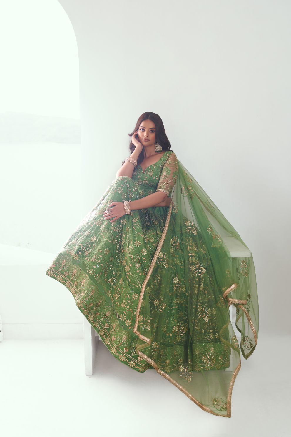 Graceful Net Lehenga Choli with Intricate Embroidery for Engagement Wear