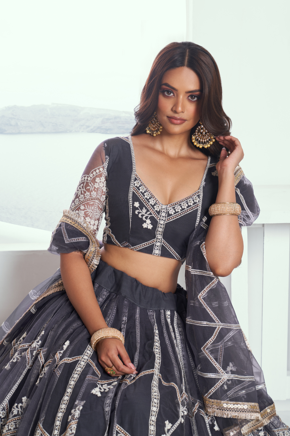 Graceful Net Lehenga Choli with Intricate Embroidery for Engagement Wear