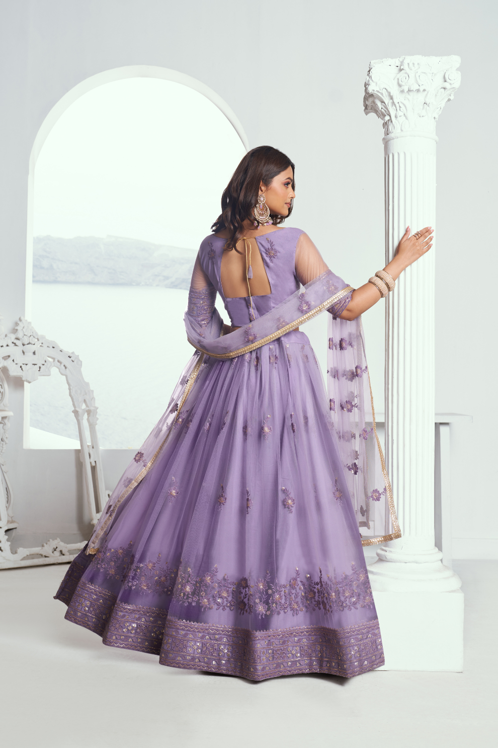 Graceful Net Lehenga Choli with Intricate Embroidery for Engagement Wear