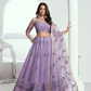 Graceful Net Lehenga Choli with Intricate Embroidery for Engagement Wear