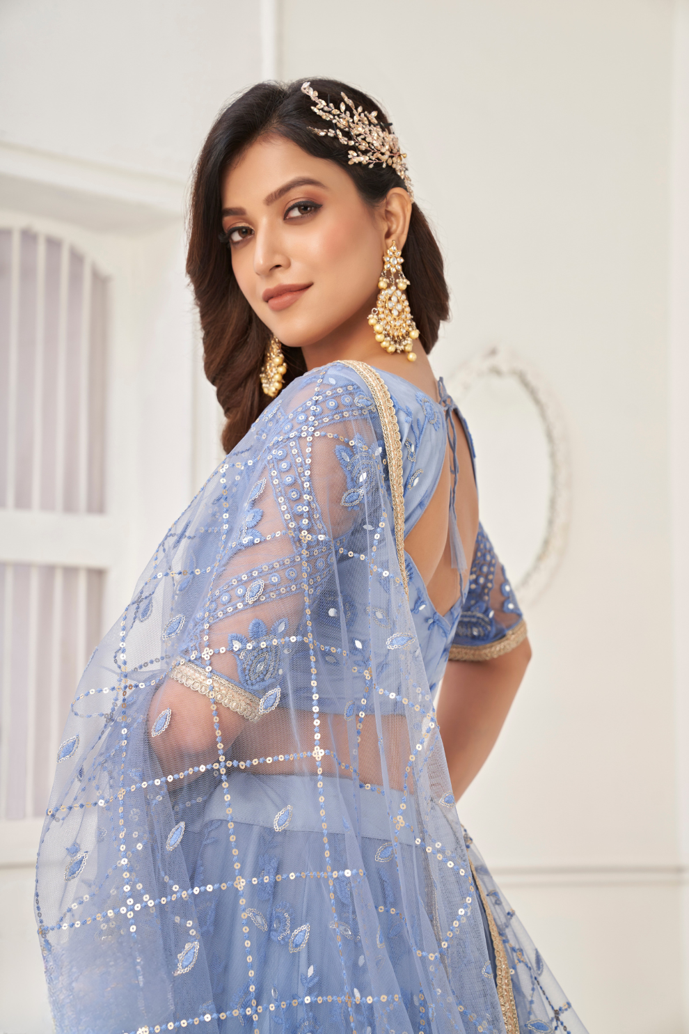 Glamorous Party Wear Lehenga in Butterfly Net with Embroidery Work