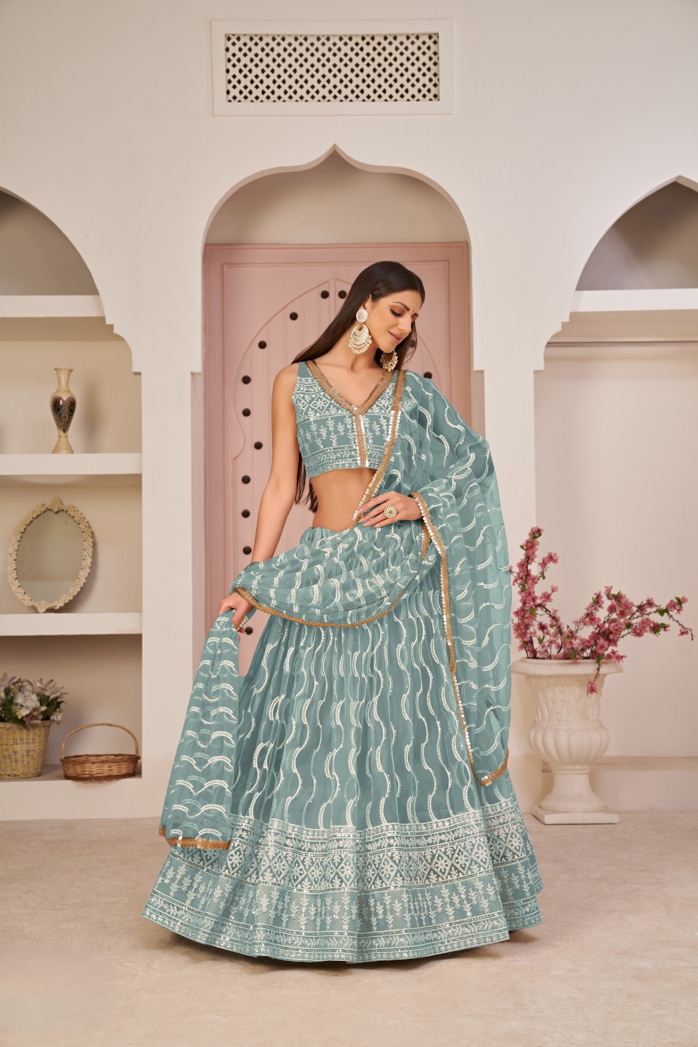 Beautifully Embroidered Net Lehenga with Sequin and Thread Detailing