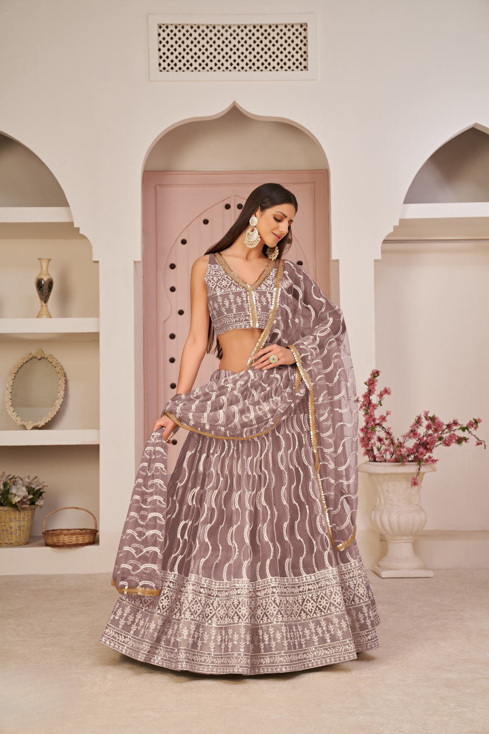 Beautifully Embroidered Net Lehenga with Sequin and Thread Detailing