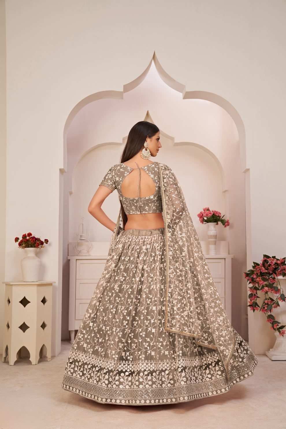 Beautifully Embroidered Net Lehenga with Sequin and Thread Detailing
