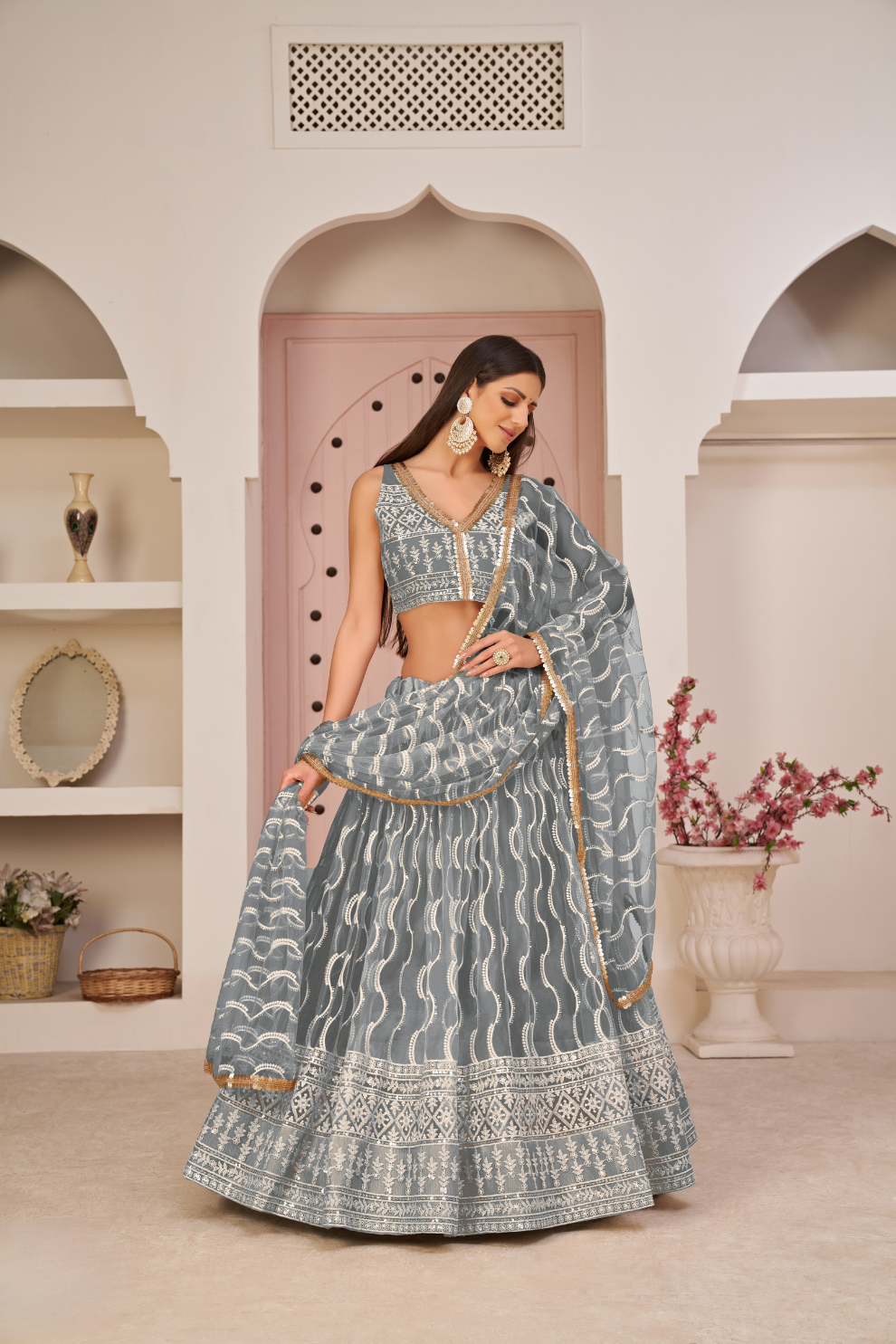 Beautifully Embroidered Net Lehenga with Sequin and Thread Detailing