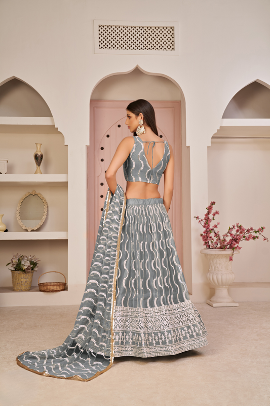 Beautifully Embroidered Net Lehenga with Sequin and Thread Detailing