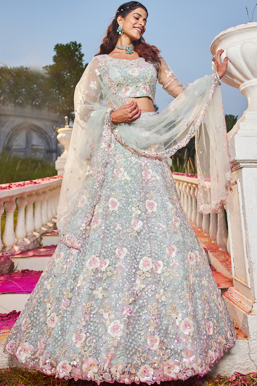 Designer Net Lehenga Choli with Intricate Sequins and Zarkan Work