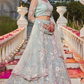 Designer Net Lehenga Choli with Intricate Sequins and Zarkan Work