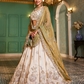 Elegant Tissue Lehenga Choli with Sequins and Thread Embroidery and Matching Dupatta