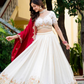 Traditional Ivory Lehenga Set with Intricate Embroidery & Red Dupatta