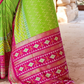 Artisanal Patola Silk Saree with Elegant Tassel Touch