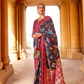 Artisanal Patola Silk Saree with Elegant Tassel Touch