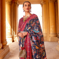 Artisanal Patola Silk Saree with Elegant Tassel Touch