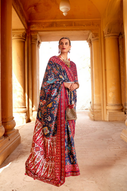 Artisanal Patola Silk Saree with Elegant Tassel Touch