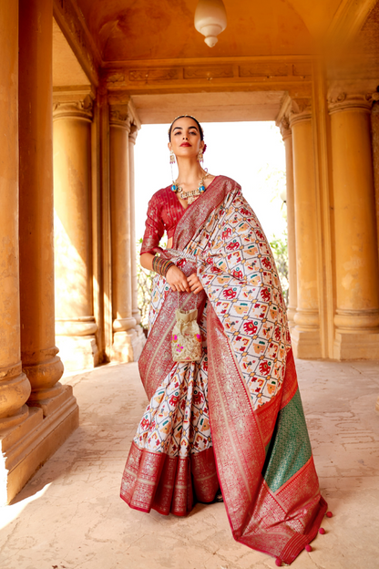 Artisanal Patola Silk Saree with Elegant Tassel Touch