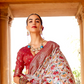 Artisanal Patola Silk Saree with Elegant Tassel Touch