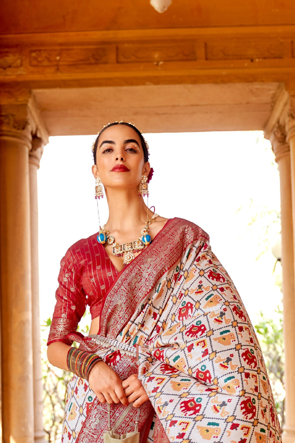 Artisanal Patola Silk Saree with Elegant Tassel Touch