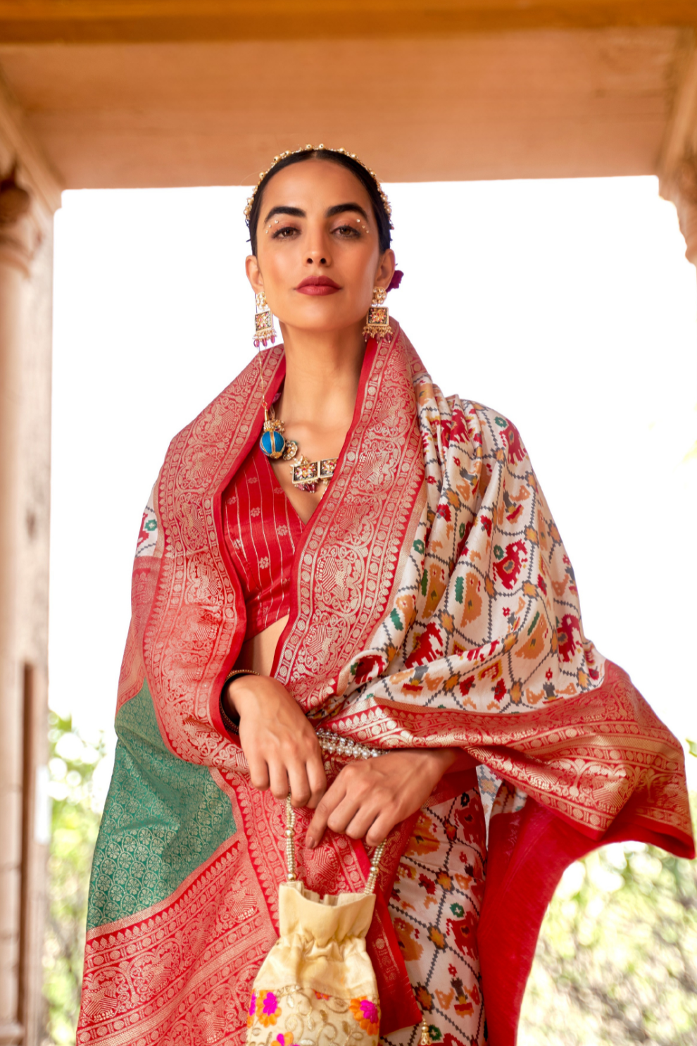 Artisanal Patola Silk Saree with Elegant Tassel Touch