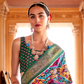 Artisanal Patola Silk Saree with Elegant Tassel Touch