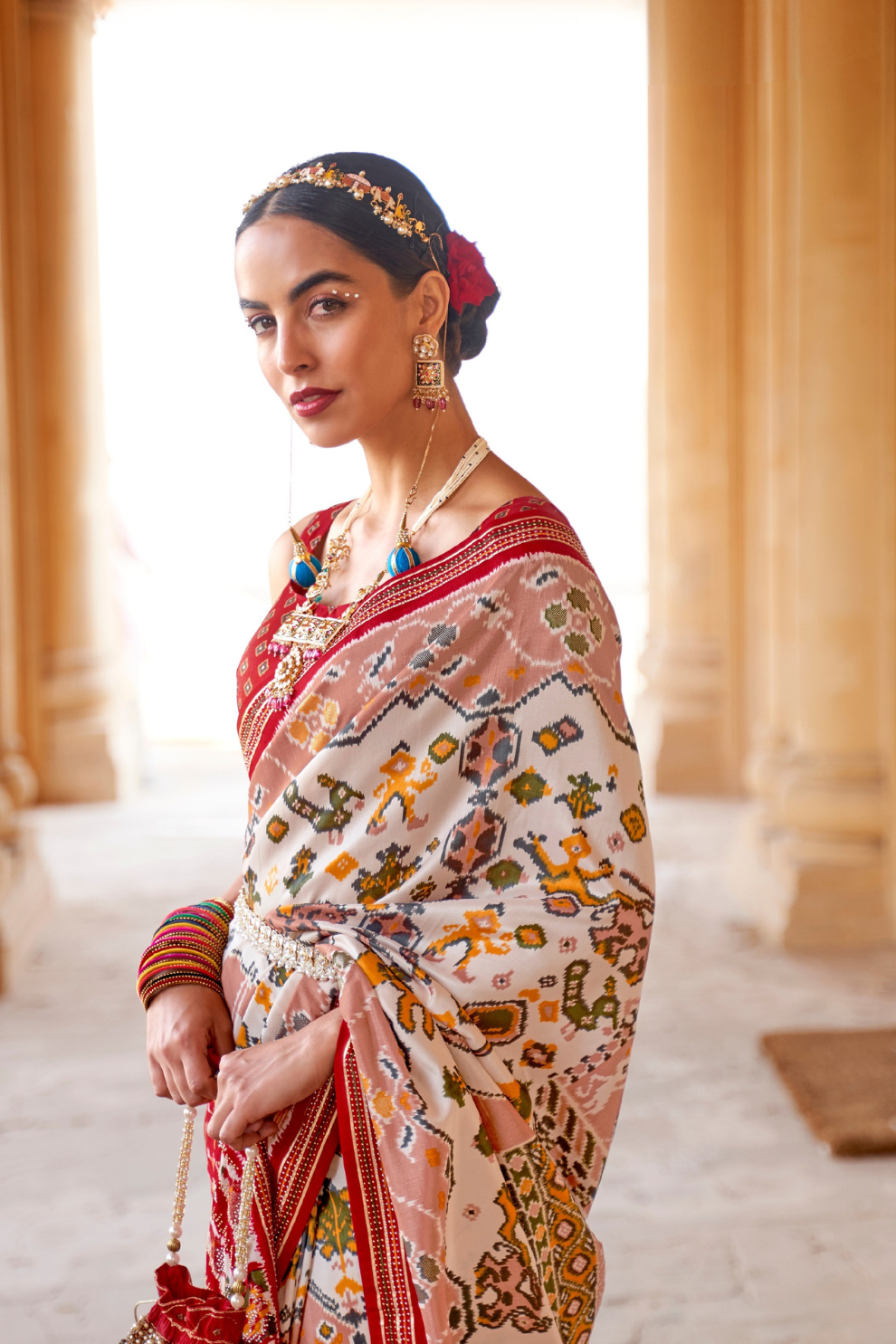 Artisanal Patola Silk Saree with Elegant Tassel Touch