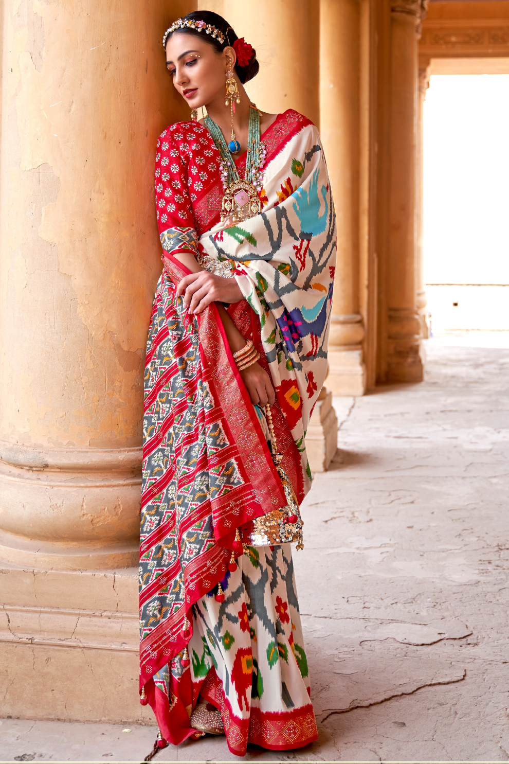 Artisanal Patola Silk Saree with Elegant Tassel Touch