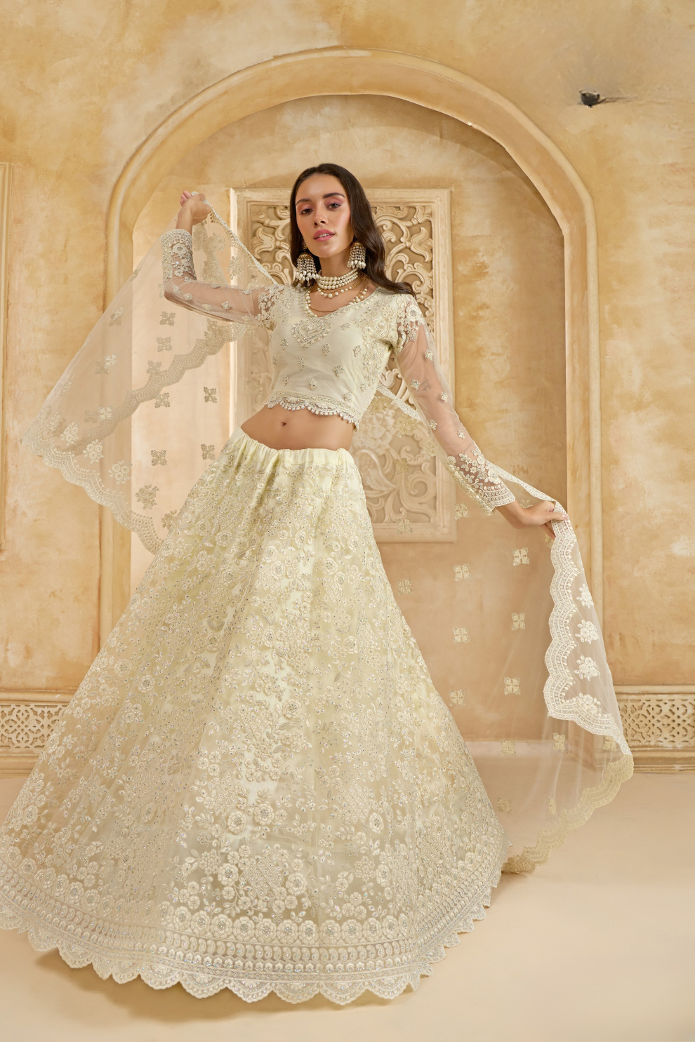 Soft Cream Net Lehenga Choli With Opulent Bridal Embroidery