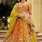 Mustard Orange Silk Bridal Lehenga with Contrast Lime Green Scalloped Dupatta