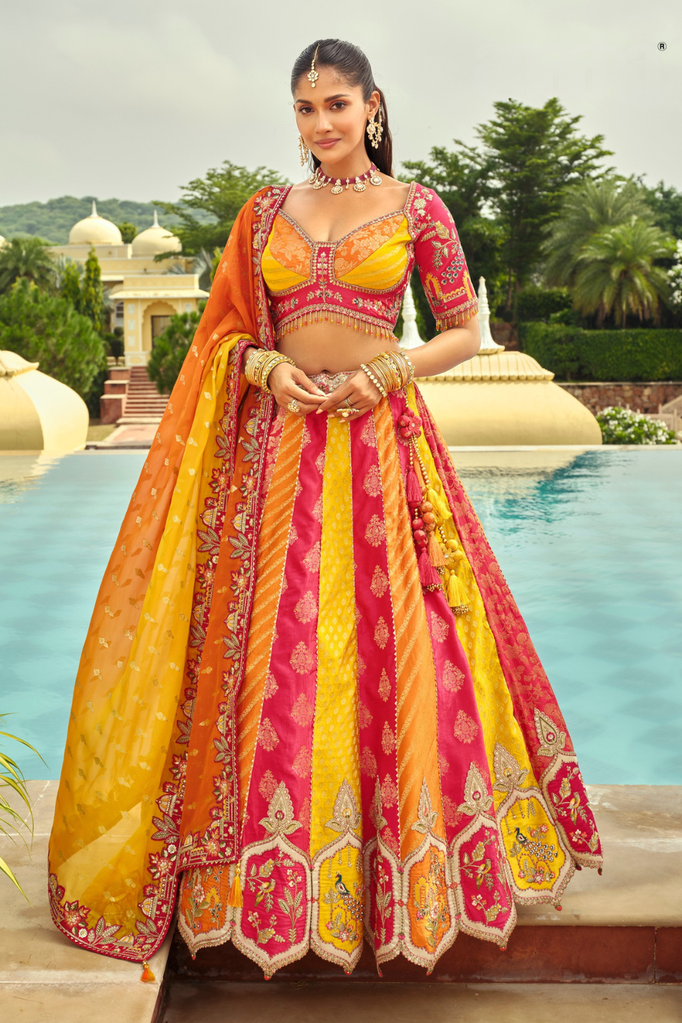 Sunset Orange and Pink Embroidered Silk Bridal Lehenga with Cut-Work Hem